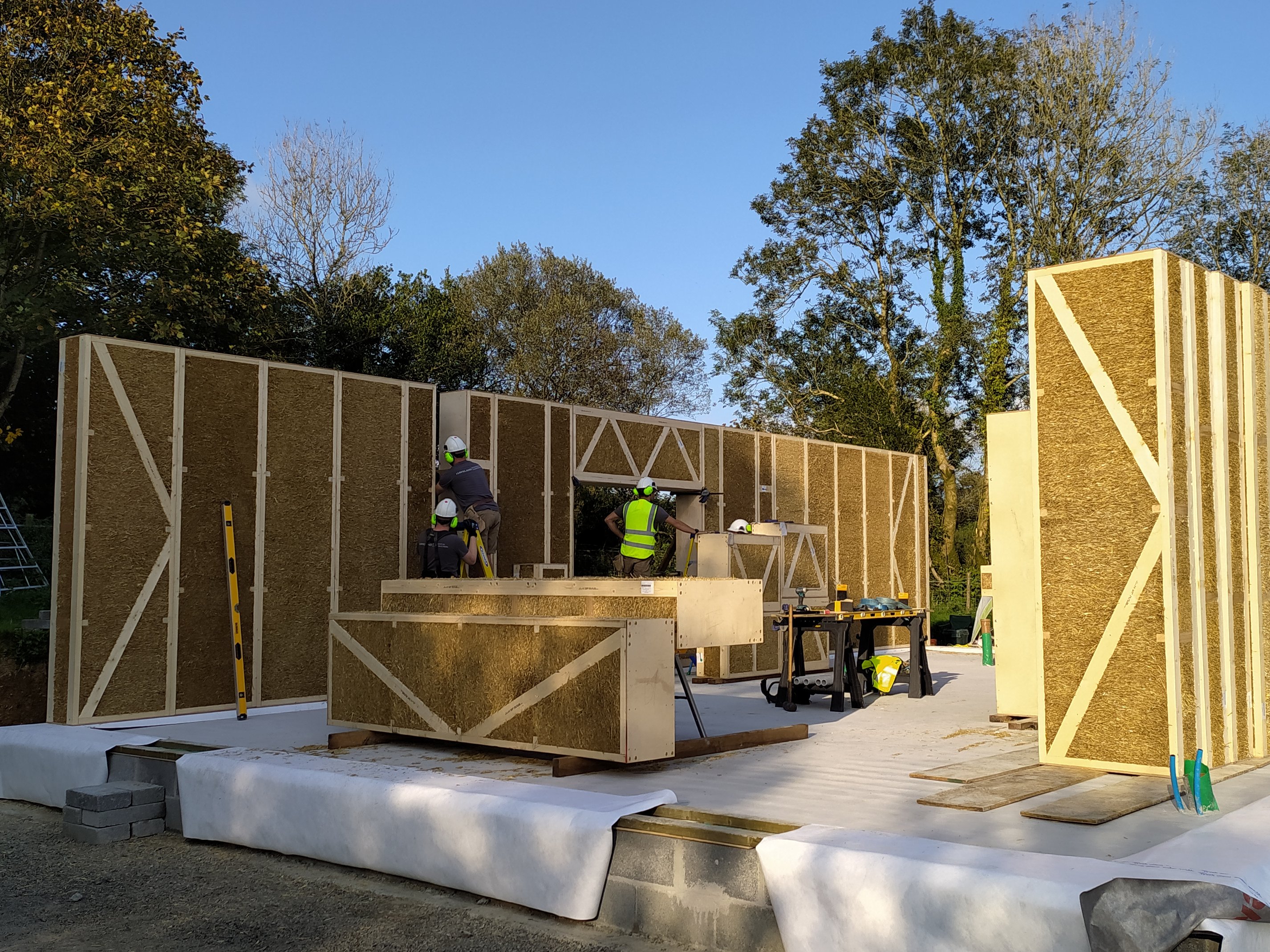 Straw bale structured insulated panels at Parc y Rhodyn off-grid Passivhaus. Image credit: Hawland